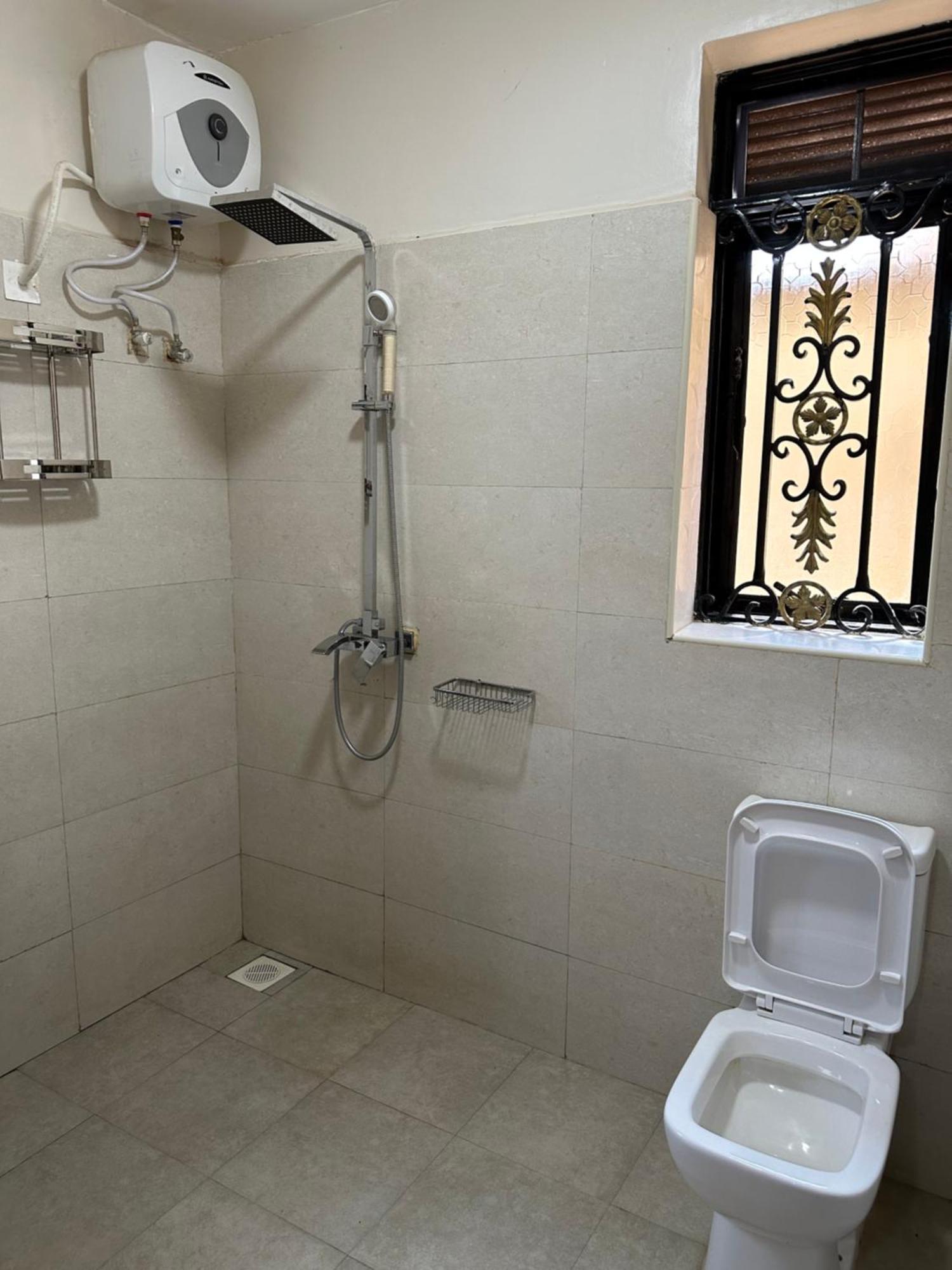 Elena & Kimberly Apartment Gulu Екстериор снимка