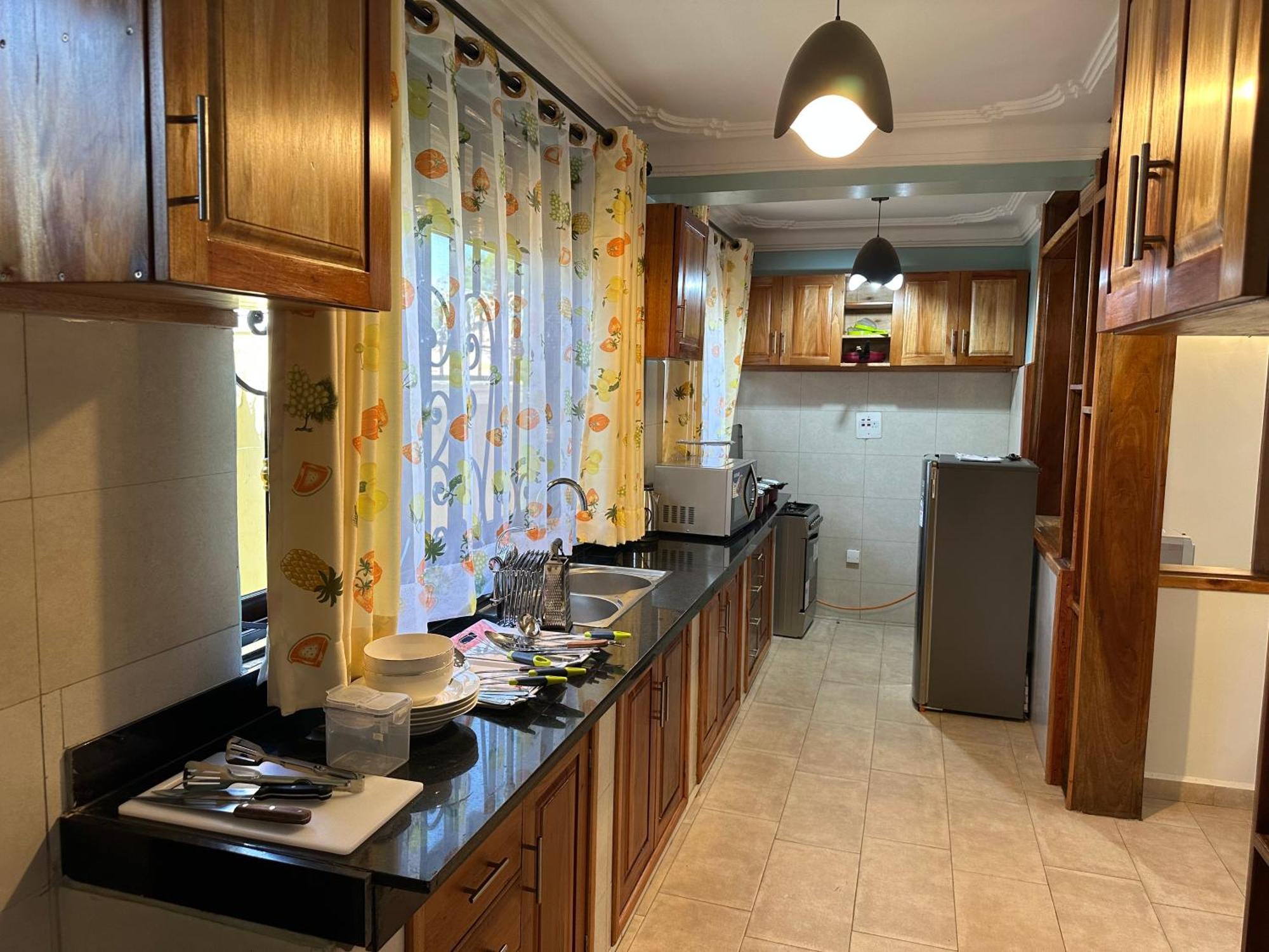 Elena & Kimberly Apartment Gulu Екстериор снимка