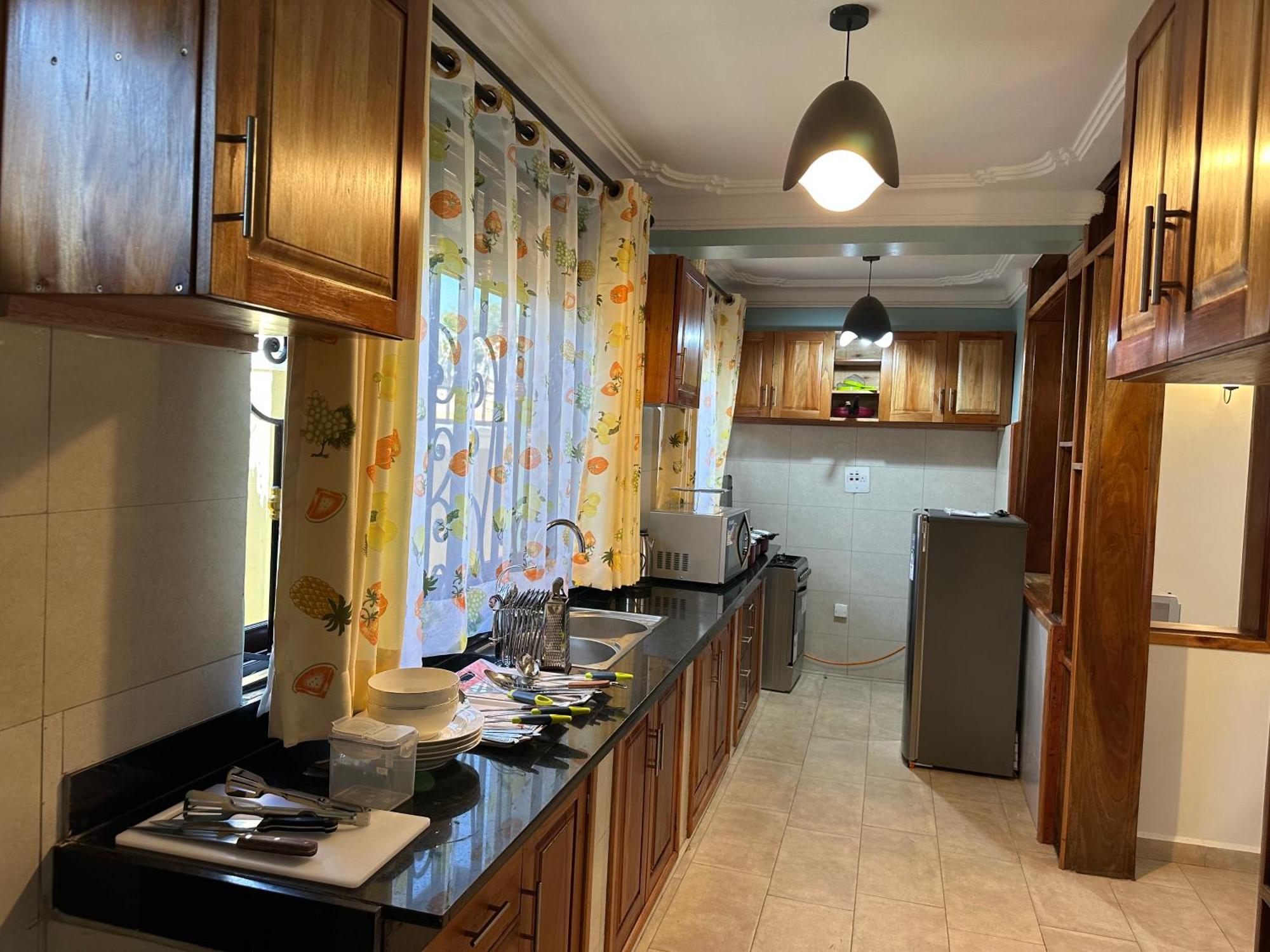 Elena & Kimberly Apartment Gulu Екстериор снимка