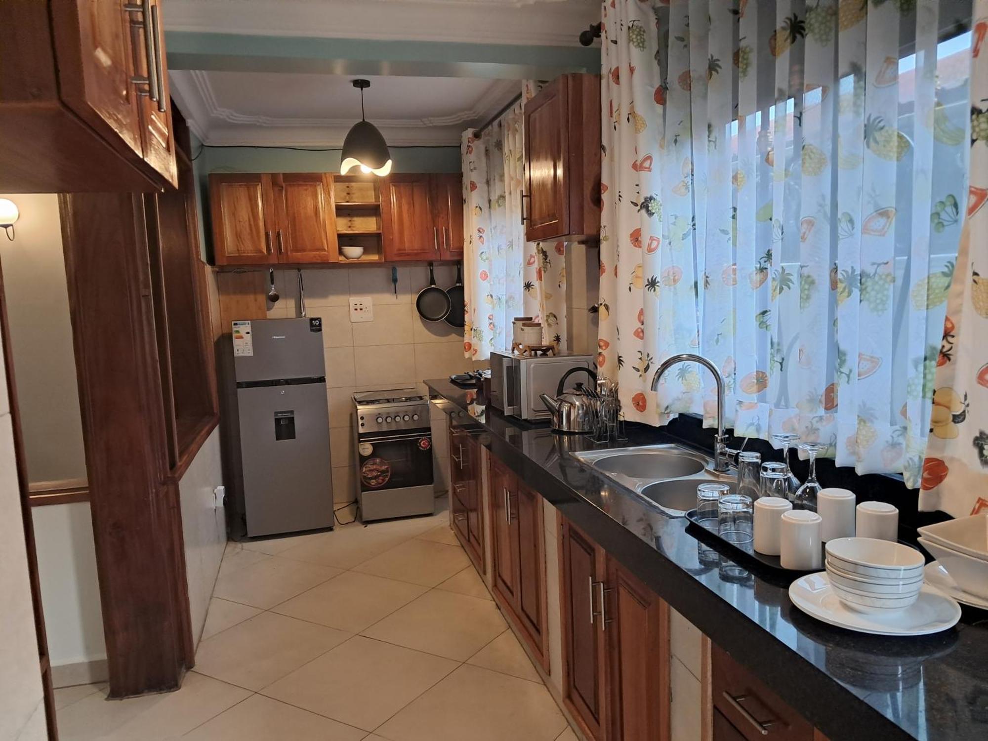 Elena & Kimberly Apartment Gulu Екстериор снимка